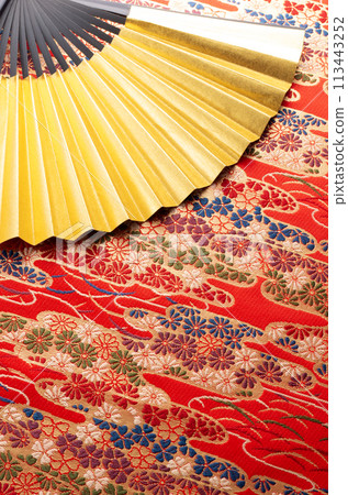 Golden fan and Japanese pattern cloth Golden fan and Japanese pattern cloth 113443252