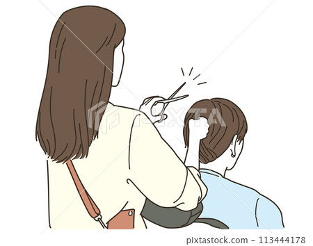 Asian female hairdresser cutting the hair of a male customer 113444178