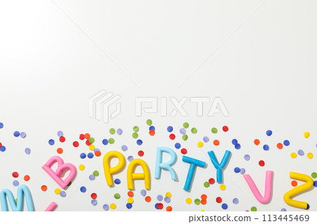 The word "party" from colored plasticine on a white background. 113445469
