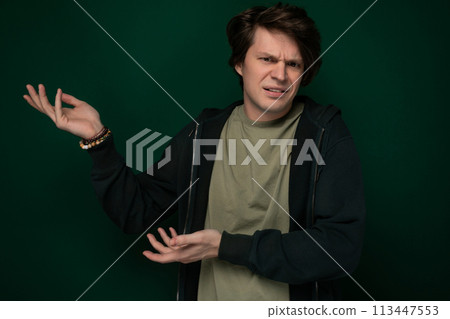Man in Black Jacket Holding Out Hands Man in Black Jacket Holding Out Hands 113447553