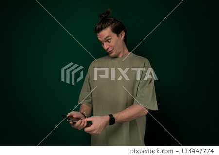 Man Holding Smart Phone in Hands 113447774