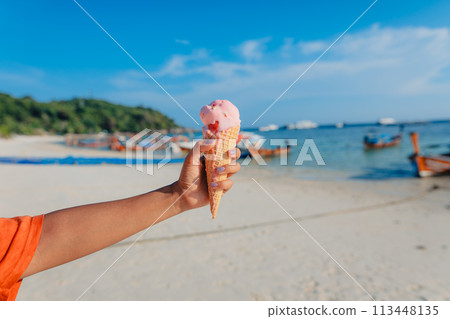 Ice cream cone at the beach in summer 113448135