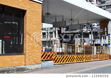Closed gas station and streetscape Closed gas station and streetscape 113448358