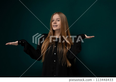 Woman in Black Shirt Holding Out Hands Woman in Black Shirt Holding Out Hands 113448433
