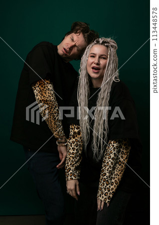 Man and Woman Posing for Picture Man and Woman Posing for Picture 113448578