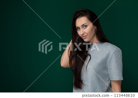 Woman With Long Hair Posing for a Picture 113448610
