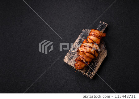 Delicious kebab of chicken or pork meat with salt, spices and herbs Delicious kebab of chicken or pork meat with salt, spices and herbs 113448731