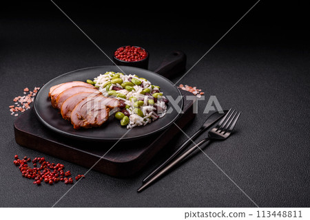 Delicious white cooked rice with green edamame beans with salt and spices Delicious white cooked rice with green edamame beans with salt and spices 113448811