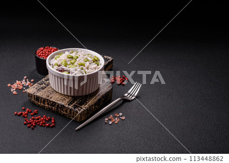 Delicious white cooked rice with green edamame beans with salt and spices Delicious white cooked rice with green edamame beans with salt and spices 113448862
