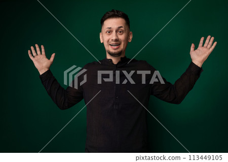 Man Standing in Front of Green Background Man Standing in Front of Green Background 113449105