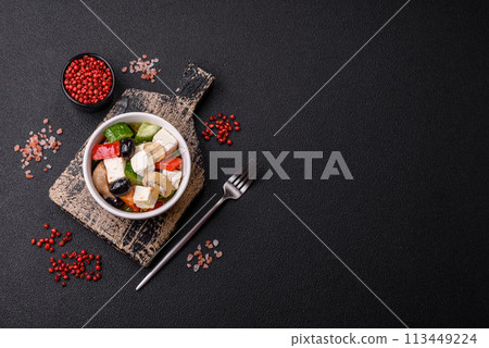 Delicious fresh juicy salad of sweet peppers, cheese, olives, tomatoes, cucumbers Delicious fresh juicy salad of sweet peppers, cheese, olives, tomatoes, cucumbers 113449224