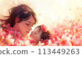 Woman and Child Frolicking in Field of Flowers 113449263