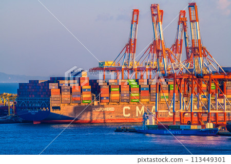 Yokohama cityscape in Japan, including the container yard at Honmoku Pier and the container ship CMA CGM PRIDE (3rd) Yokohama cityscape in Japan, including the container yard at Honmoku Pier and the container ship CMA CGM PRIDE (3rd) 113449301