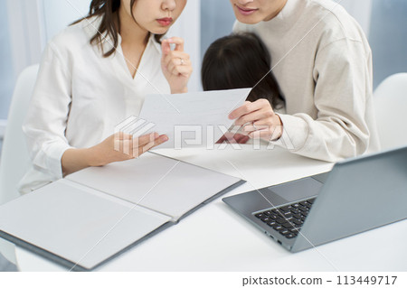 Families considering purchasing insurance 113449717