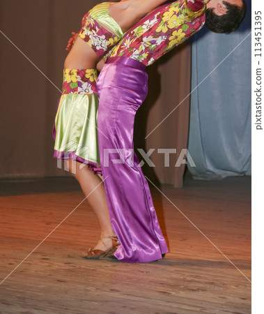 Latino dancers in ballroom 113451395