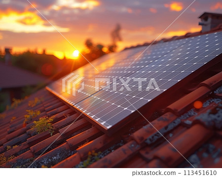 Solar Panels on House Roof at Sunset. Solar Energy Alternative Energy Renewable Concept. Photovoltaic Technology 113451610