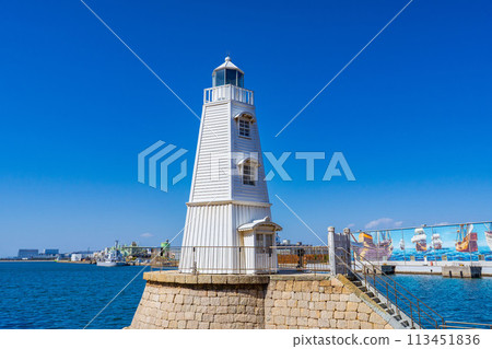 Sakai City, Osaka Prefecture: The old wooden Sakai Lighthouse stands out against the blue sky Sakai City, Osaka Prefecture: The old wooden Sakai Lighthouse stands out against the blue sky 113451836