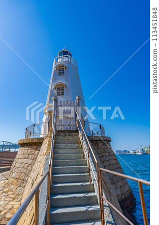 Sakai City, Osaka Prefecture: The old wooden Sakai Lighthouse stands out against the blue sky Sakai City, Osaka Prefecture: The old wooden Sakai Lighthouse stands out against the blue sky 113451848