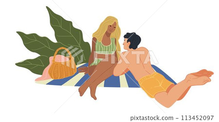Man and woman laying on beach, picnic of couple 113452097