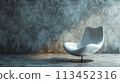 A white chair sitting in front of a concrete wall, AI 113452316