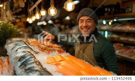 Friendly fishmonger giving thumbs-up fish market stall. Seafood market concept design advertising Friendly fishmonger giving thumbs-up fish market stall. Seafood market concept design advertising 113452498