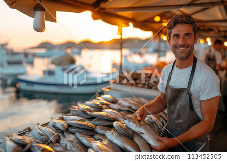 Young fishmonger with fresh catch fish market. Healthy seafood concept for design and lifestyle Young fishmonger with fresh catch fish market. Healthy seafood concept for design and lifestyle 113452505