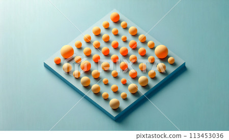Orange ball on a light blue table 113453036
