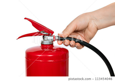 A red fire extinguisher with black hose on white background 113454046