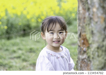 Girls playing in the park 113454782