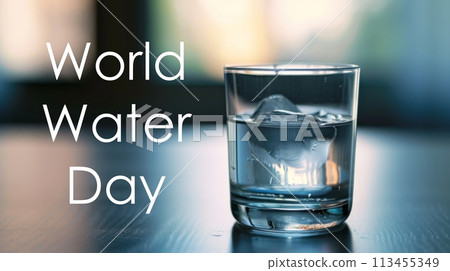 Clear glass of water with ice on blue table. Isolated on blue background. 113455349