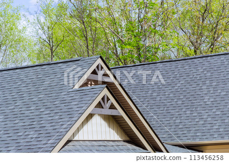 Rooftop of newly built house is covered asphalt shingles roofing construction 113456258