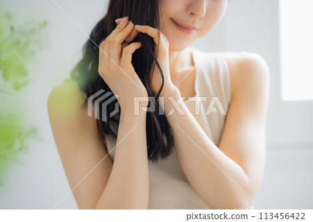 Young women stretching 113456422