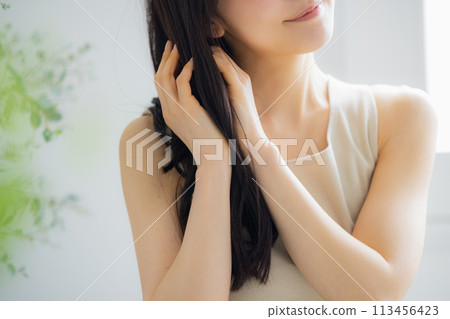 Young women stretching 113456423