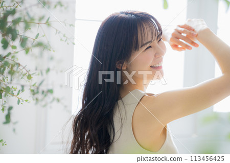 Young women stretching 113456425