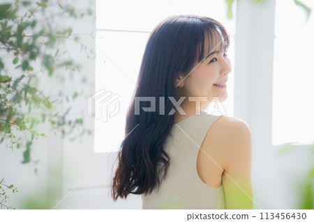 Young women stretching 113456430