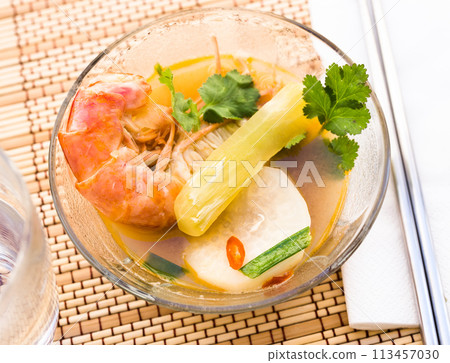 Thai soup with seafood and vegetables Thai soup with seafood and vegetables 113457030