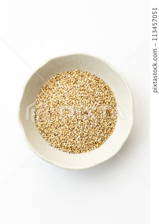 Roasted sesame seeds on white background 113457051