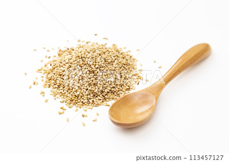 Roasted sesame seeds on white background 113457127