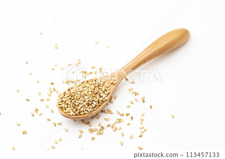 Roasted sesame seeds on white background 113457133