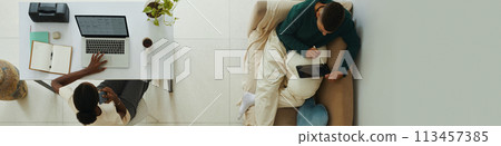 Header with young couple working from home 113457385