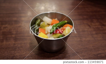 Acar is a type of vegetable pickle of Maritime Southeast Asia, most prevalent in Indonesia, Malaysia, Singapore and Brunei. Served as the condiment for any meals. 113459071