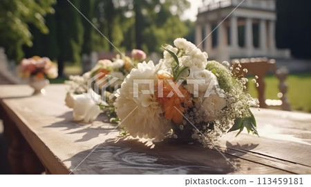 Flower bouquet at the outdoor dinning table as decoration for wedding reception dinner event. 113459181