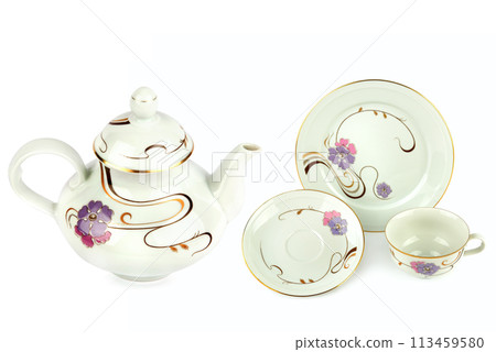 Vintage porcelain teapot, cups and saucers isolated on white. Collage. 113459580