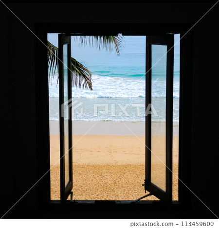 View from the window to the tropical beach. 113459600