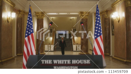 US President comes to tribune and starts inspirational political speech 113459709