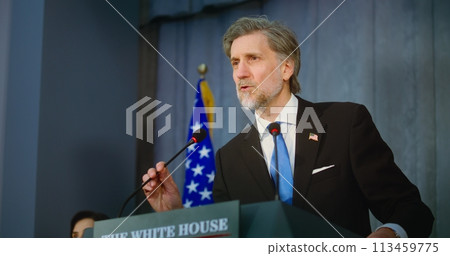 US presidential candidate pronounces campaign speech from the tribune 113459775