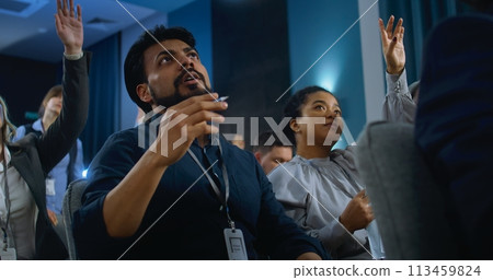 Indian male journalist raises hand, asks question from politician 113459824