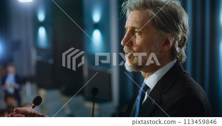 Male organization representative pronounces speech during press campaign 113459846