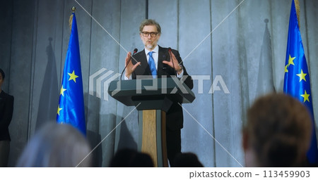 Mature representative of European Union performs at conference 113459903
