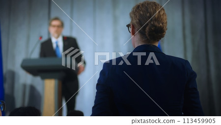 Female representative of media stands up and asks question 113459905